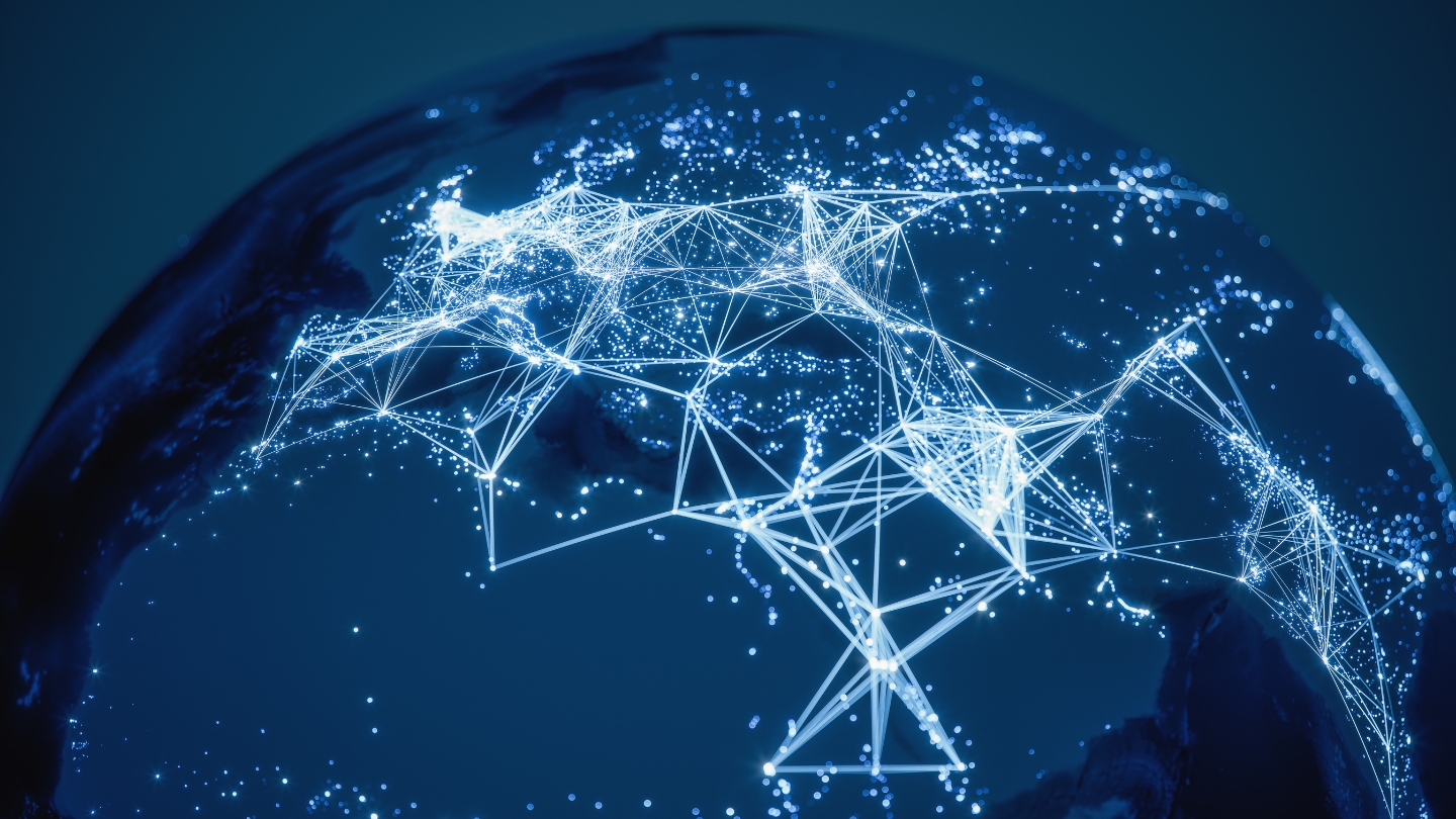 a globe with electronic connections scattered over it, alluding to people tracing