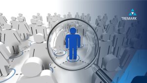 a magnifying glass over somebody standing out in a crowd