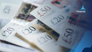 bank notes scattered across the floor, alluding to debt recovered through serving a statutory demand